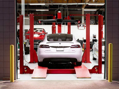 Service Your Tesla at a center or at home